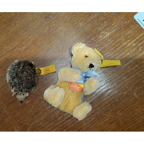 211C - A Steiff teddy miniature and a smaller Steiff hedgehog