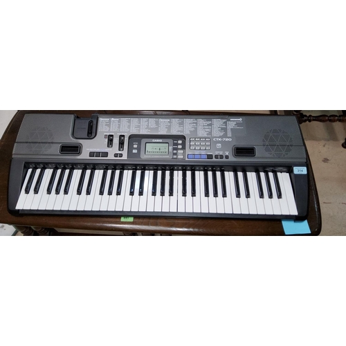 314 - A Casio CTK-720 keyboard with power supply