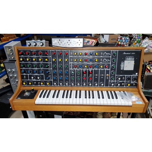 315 - An ETI International 460 keyboard synthesiser (sold as a collector's item - not PAT tested) with cus... 