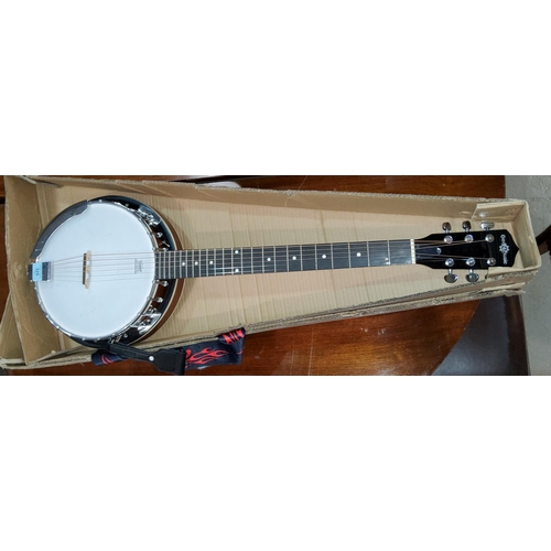 325 - A 6 string banjo by Remo