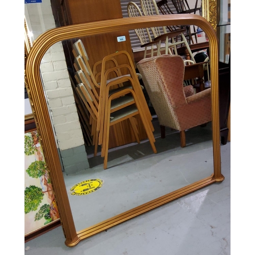 808 - An overmantel mirror in Victorian style gilt frame; a rectangular wall mirror in cream frame