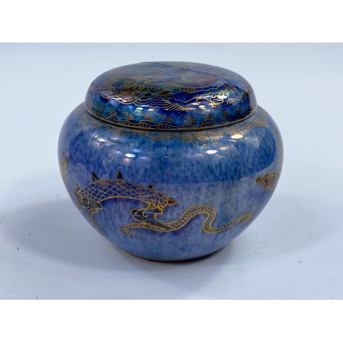 484 - A Wedgwood lustre covered circular pot decorated with dragons against a mottled blue ground, Z4829, ... 