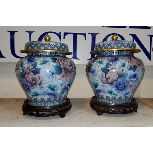 406A - A pair of Chinese cloisonné lidded vases on hardwood stands