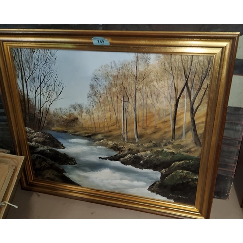 749 - Two framed still life oils of flowers; a river scene oil framed