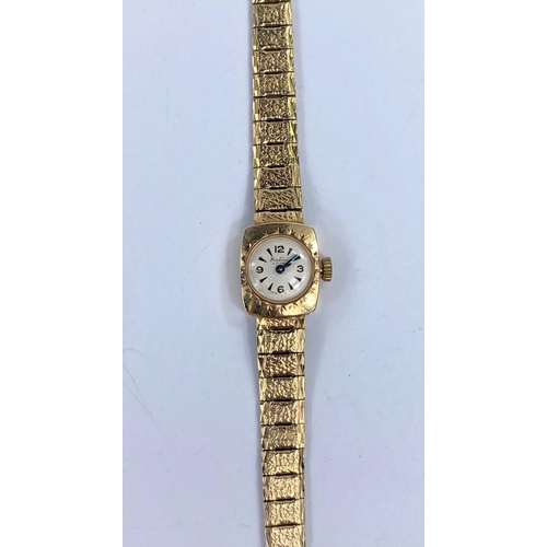 614 - A ladies Bentima wristwatch on 9 carat hallmarked gold bracelet, 15 gm gross