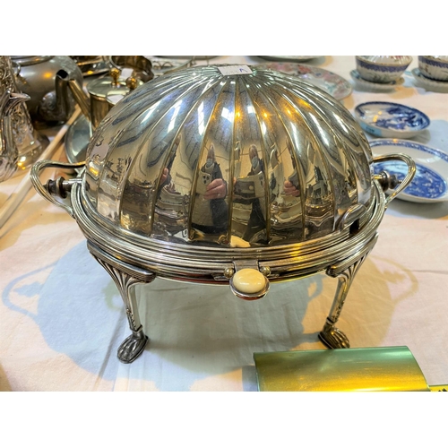 633A - A Silver plated dome top revolving breakfast dish by Mappin
& Webb
