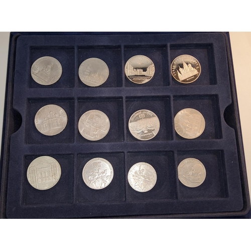 3 - A collection of coins and medallions, including some items of Russian interest.