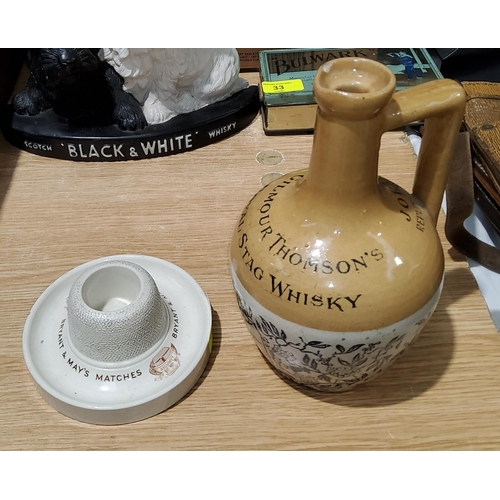 34 - A ceramic match striker by Minton for Bryant & May; a stoneware whisky decanter for Gilmour Thomson'... 