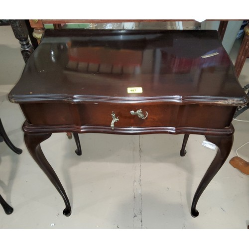838 - A small mahogany occasional table with single draw and another two tier