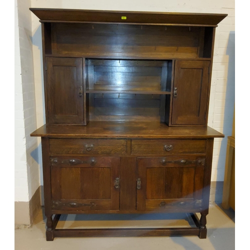 834 - An early 20th century oak dresser of Art Nouveau style with applied iron hinges and handles 152cm