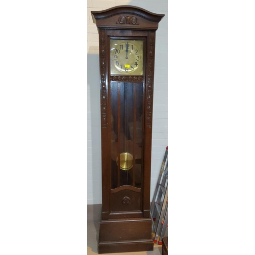906 - An early 20th century oak long case clock in Arts & Crafts carved case with striking movement