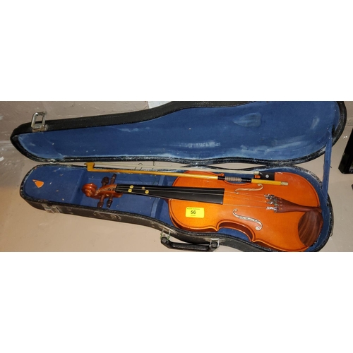 133 - A modern cased 3/4 size student's violin and bow 31.5cm