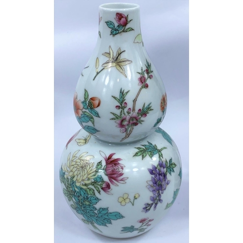 432 - A Chinese double gourd vase decorated with flowers and insects and mark to base, height 22cm; a Chin... 