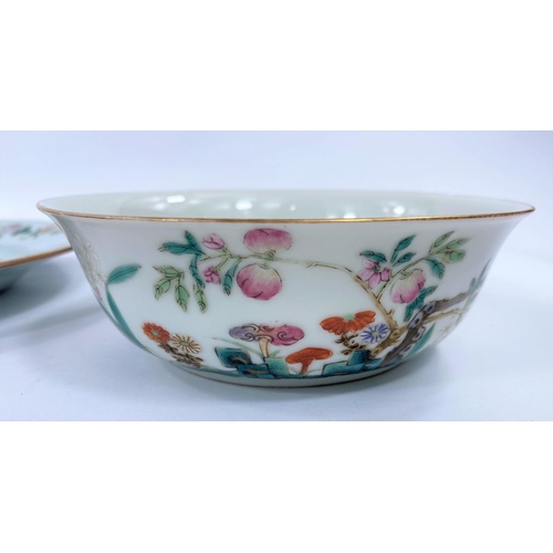 405 - An 18th century Chinese polychrome decorated floral plate, d. 23cm and a later Chinese bowl decorate... 