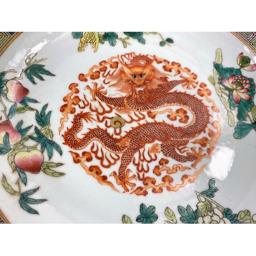406 - 2 Chinese dishes decorated with central dragon, both with 6 character to base, polychrome decoration... 