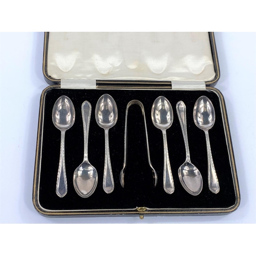 683 - A hallmarked silver set of 6 teaspoons and tongs, cased, Sheffield 1924, 3 oz