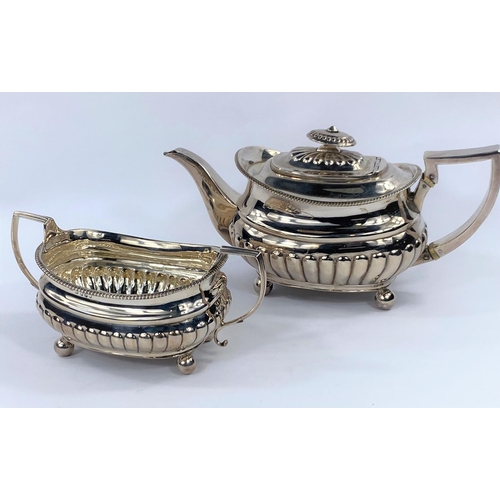 710 - A silver Regency boat shaped teapot and matching sugar basin, London 1810, maker Samuel Hennell, 260... 