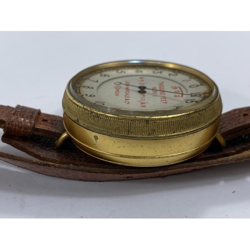 170 - A WWI Royal Flying Corps wrist worn brass cased Altimeter by John Wardale & Co, London, on brown... 