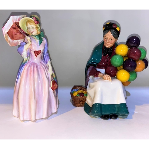 507 - A Royal Doulton figure 'Miss Demure' HN 1402 potted by Doulton, a Doulton figure the Balloon Seller,... 