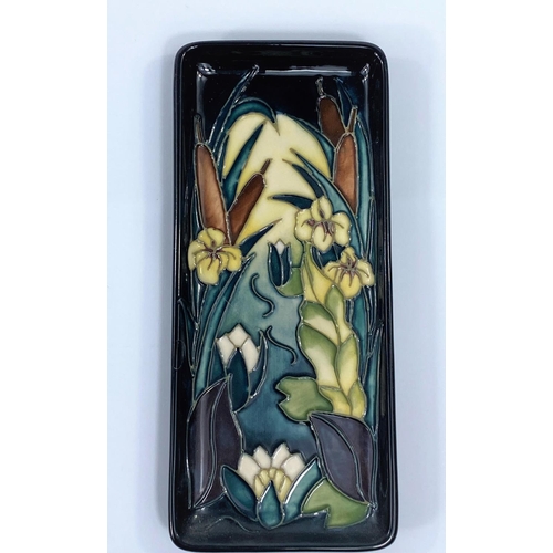 517 - A MOORCROFT rectangular dish decorated with flowers, 20cm 
