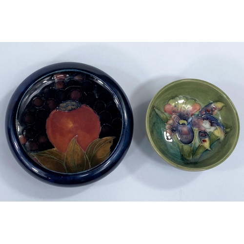 518 - A MOORCROFT miniature bowl decorated with an Iris, 8cm and a pomegranate pattern pin dish, 11cm