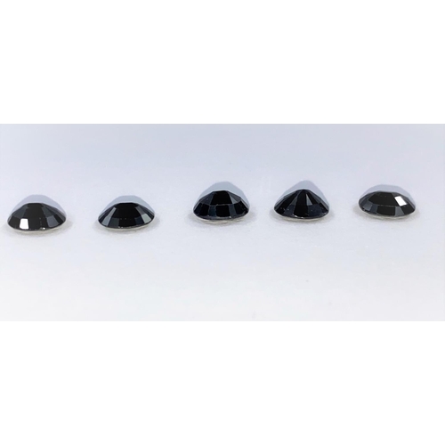 652 - Five loose dark blue oval cut sapphires, total weight 11.45 carats