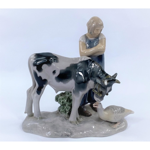618 - A B & G group, girl with cow and goose, height 21cm