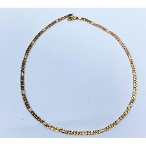 675 - A yellow metal chain of flattened curb form, with alternating 5 link and elongated link sections, st... 