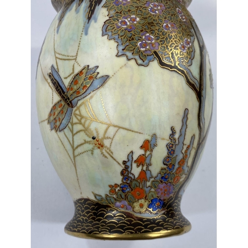 542 - A 1930's Fielding's Crown Devon vase of ovoid form, decorated with trees, spider in a web, etc., hei... 