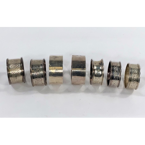 684 - Nine hallmarked silver various napkin rings, various dates and assay offices, 4.25
