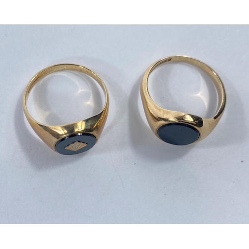 643 - Two 9 carat hallmarked gold signet rings set with obsidian, gross weight 8.7gm