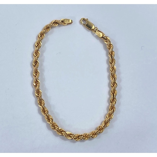 648 - A 9 carat hallmarked gold rope twist bracelet, 3.9gm