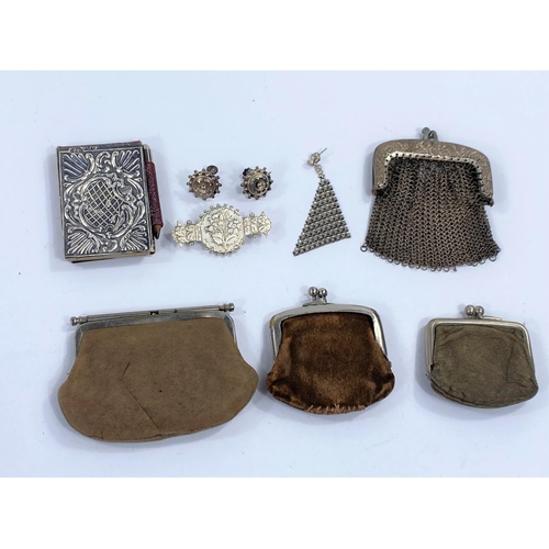 722 - A selection of early 20th century coin purses, silver covered Aide Memoire, a pair of spectacles and... 
