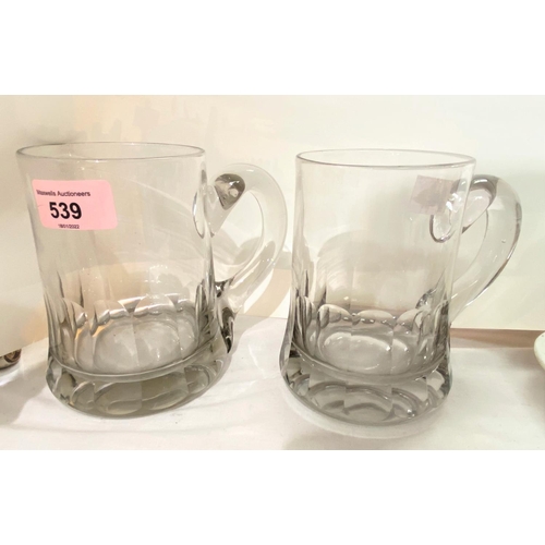 539 - A pair of 19th century glass tankards with sliced decoration height 13.5cm and a smaller similar tan... 