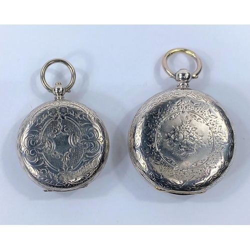 688 - Two white metal fob watches with chased decoration and decorative dials