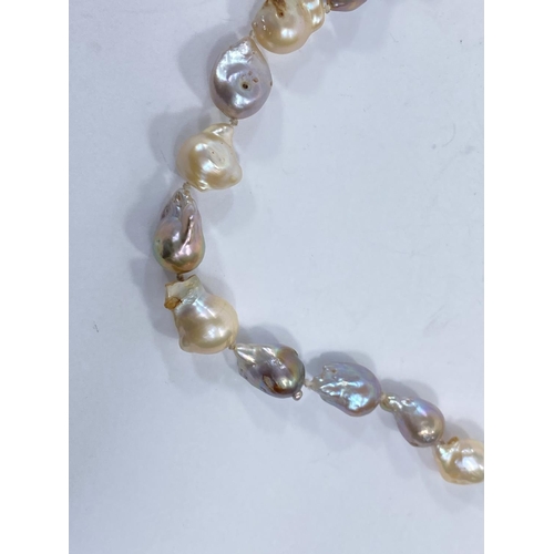 716b - A string of Baroque South Sea pearls with white metal clasp