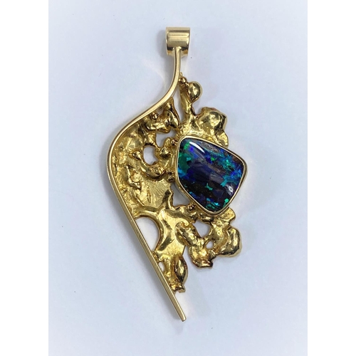 717A - A 1970’s 18 carat gold Brutalist pendant set asymmetrical black opal, length 4.7cm, 10.3gm, initiall... 
