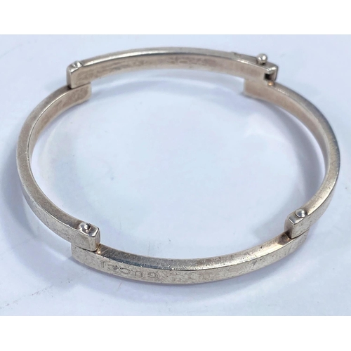 718a - A vintage white metal pinioned bracelet stamped 925 in 4 sections, etched Gucci, Made in Italy, 34gm