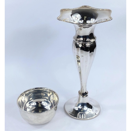 700 - A plain silver bowl, Birmingham 1944, 3.25 oz; a broken silver vase, weighable element 3.5 oz