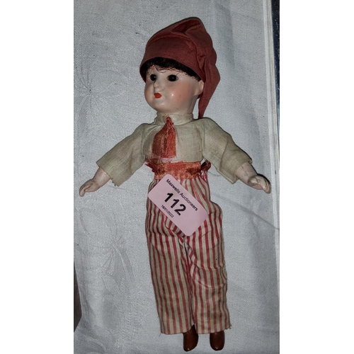 112 - A French composition head doll dress in French Revolutionary clothing 'SEBJ' Paris, height 22cm