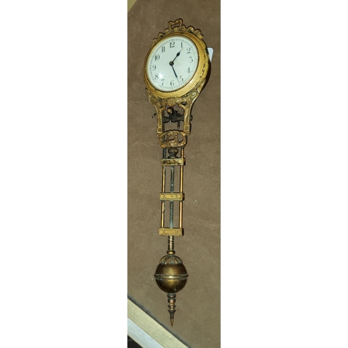 175 - A 19th century French swinging pendulum clock mechanism, 25cm