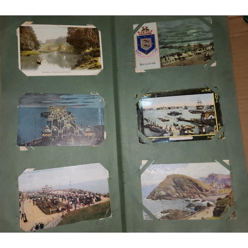 257 - Two albums of vintage postcards; a large collection of loose cards