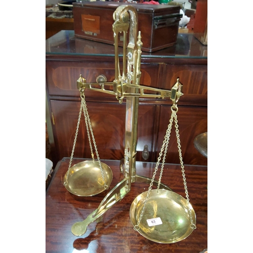 63 - A 19th century set of brass bank scales by W & T Avery, Birmingham, height 56 cm