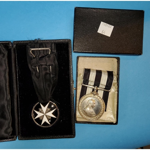 64 - St John's Ambulance Brigade:  a pair of medals, one engraved CPS/SEN M. STRANG, LANCS, S.J.A.B.... 