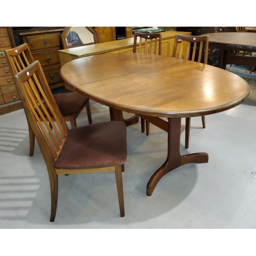 805 - A 1960's G Plan dining suite comprising oval extending dining table, extended length 210cm and a set... 