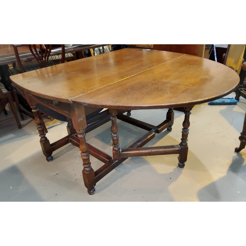 810 - A Titchmarsh and Goodwin traditional style drop leaf oval dining table, block and balluster to gatel... 