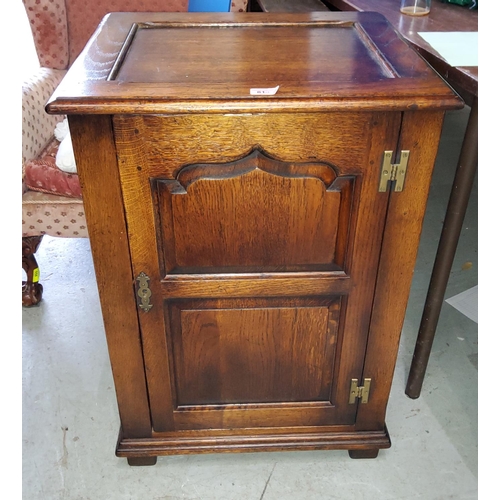 814 - An 18th century style distressed oak cupboard in the manner of Titchmarsh & Goodwin, enclosed by... 