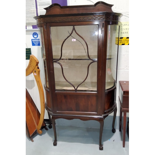 882 - An early 20th century mahogany reproduction display cabinet with 'D' front, blind fret frieze a... 