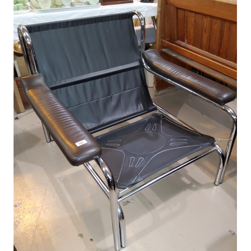 886 - A 1970's chrome armchair in dark brown leather by Pieff (sold as a collectors item only); 2 black of... 
