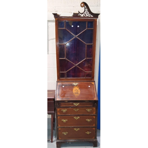 896 - A 19th century mahogany bureau/bookcase in the Georgian style, slender proportions with inset penwor... 